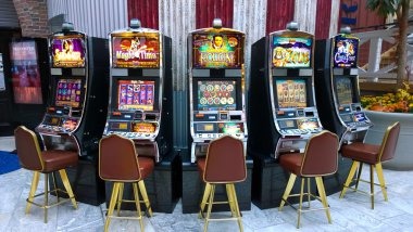 jin88 dealer training facility with game rules posters and shuffle practice stations